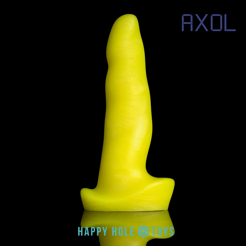 An Axol dildo in UV Sparkle Yellow, a vibrant yellow with mica swirls, on a black background. More in product description.