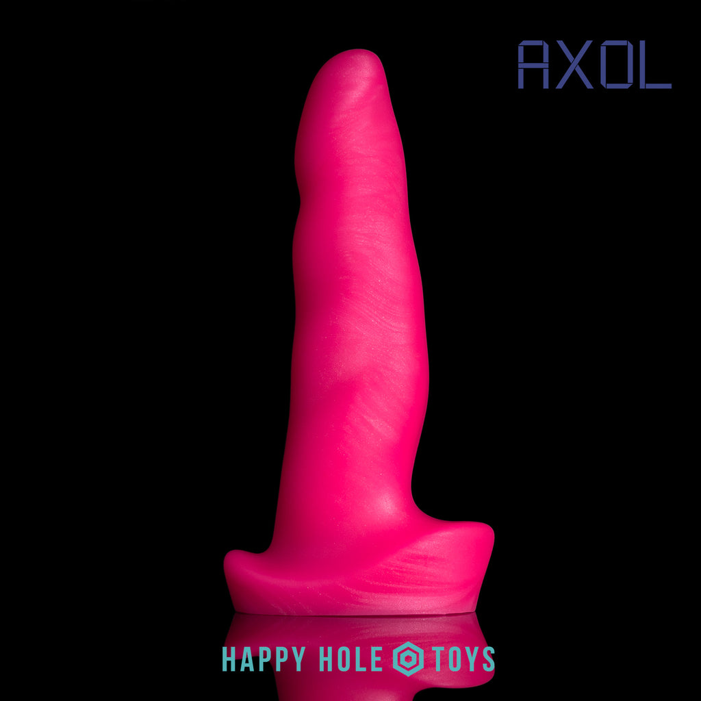 An Axol dildo in UV Sparkle Pink, a vibrant pink with mica swirls, on a black background. More in product description.